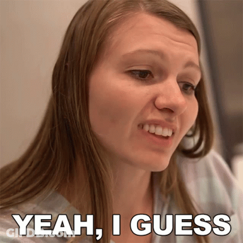 A Woman Says Yeah I Guess In Front Of A Picture Of Her Face GIF