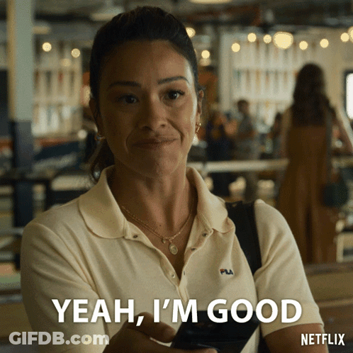 A Woman Says Yeah I 'M Good While Holding A Cell Phone GIF