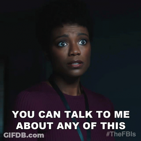 A Woman Says You Can Talk To Me About Any Of This In A Dark Room GIF