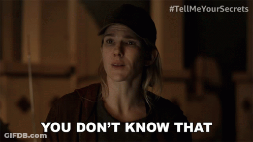 A Woman Says " You Don 'T Know That " In Front Of A Sign That Says Tell Me Your Secrets GIF