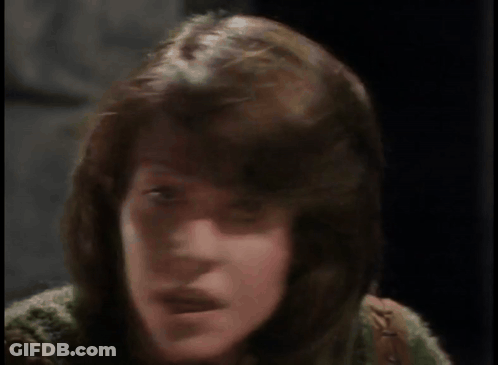 A Woman Says " You 'Re Serious Aren 'T You " In Yellow Letters GIF