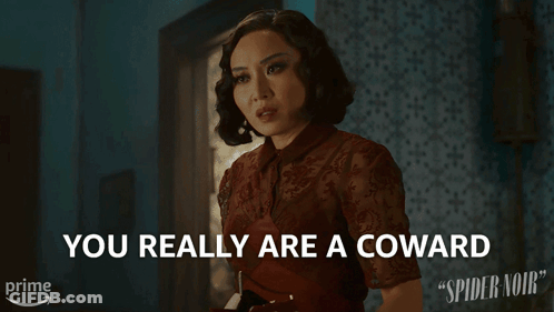 A Woman Says " You Really Are A Coward " In Front Of A Spider Noir Poster GIF