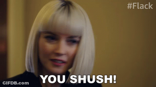 A Woman Says " You Shush " In A Blurry Photo GIF