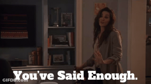 A Woman Says You 'Ve Said Enough While Standing In A Living Room GIF