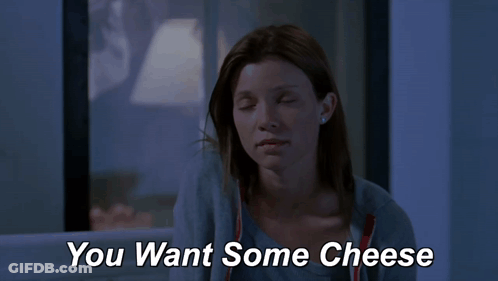 A Woman Says " You Want Some Cheese " In A Movie Scene GIF