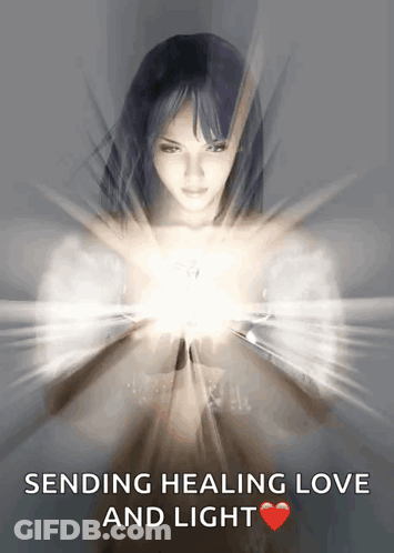 A Woman Sending Healing Love And Light With A Heart GIF