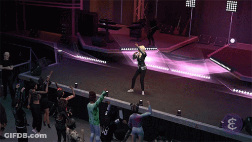 A Woman Singing In Front Of A Crowd Wearing A Number 33 Jersey GIF