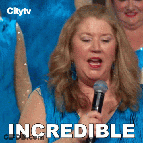 A Woman Singing Into A Microphone With The Word Incredible Written On The Bottom GIF