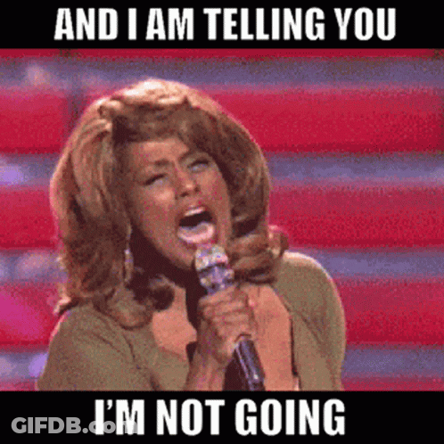 A Woman Singing Into A Microphone With The Words And I Am Telling You I 'M Not Going GIF