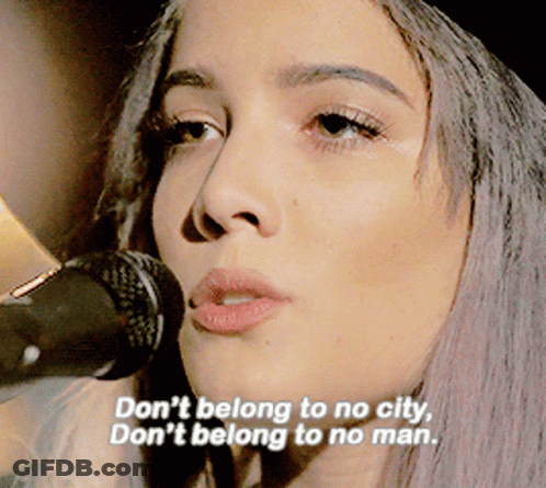 A Woman Singing Into A Microphone With The Words " Don 'T Belong To No City " GIF