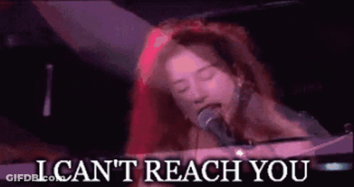 A Woman Singing Into A Microphone With The Words " I Can 'T Reach You " Above Her GIF