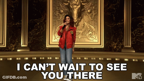 A Woman Singing Into A Microphone With The Words " I Can 'T Wait To See You There " Below Her GIF