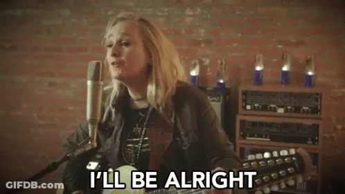 A Woman Singing Into A Microphone With The Words " I 'Ll Be Alright " Next To Her GIF