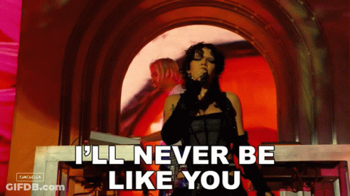 A Woman Singing Into A Microphone With The Words " I 'Ll Never Be Like You " Below Her GIF