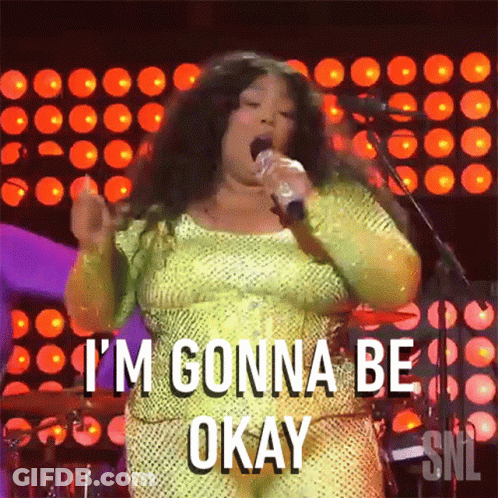 A Woman Singing Into A Microphone With The Words I 'M Gonna Be Okay GIF