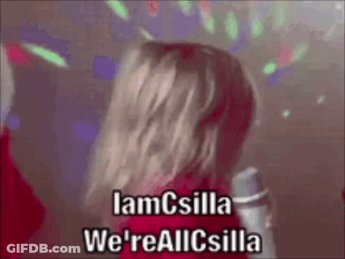 A Woman Singing Into A Microphone With The Words " Iamcsilla We 'Reallcsilla " On The Bottom GIF