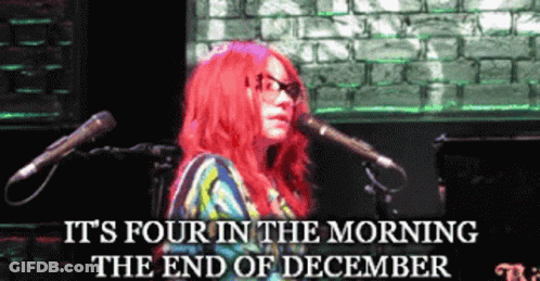 A Woman Singing Into A Microphone With The Words " It 'S Four In The Morning The End Of December " GIF