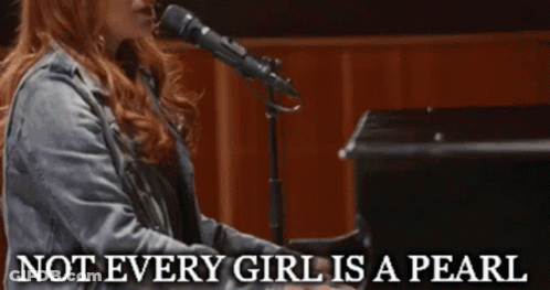 A Woman Singing Into A Microphone With The Words Not Every Girl Is A Pearl Behind Her GIF
