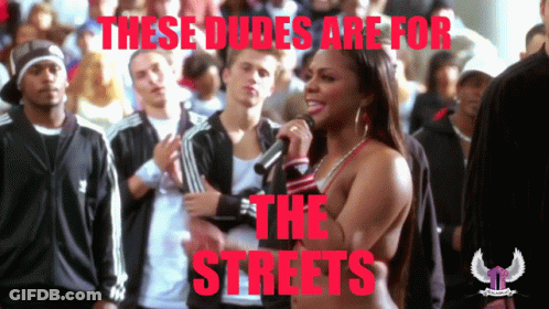A Woman Singing Into A Microphone With The Words These Dudes Are For The Streets Below Her GIF