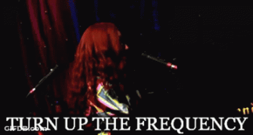 Woman Singing Into Microphone Turn Up Frequency GIF