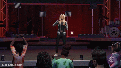 A Woman Singing On A Stage With A Nk Logo In The Corner GIF
