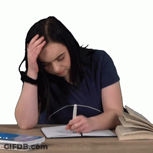 A Woman Sits At A Desk With A Book That Says " Getting Started " GIF