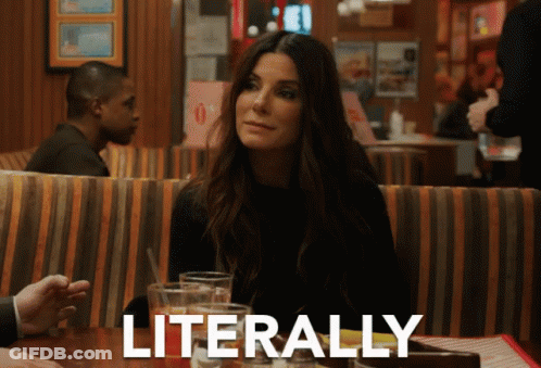 A Woman Sits At A Table In A Restaurant With Literally Written On The Bottom GIF