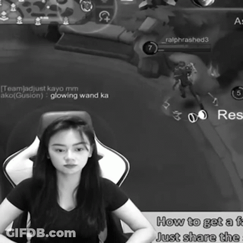 A Woman Sits In A Chair In Front Of A Screen That Says " How To Get A F " GIF