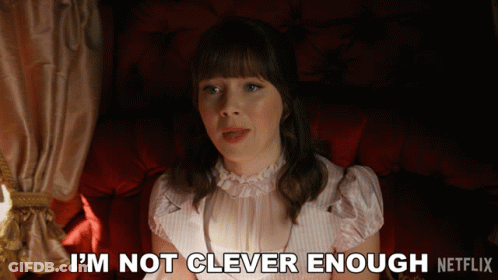 A Woman Sits In A Chair With The Words " I 'M Not Clever Enough " Written On The Bottom GIF