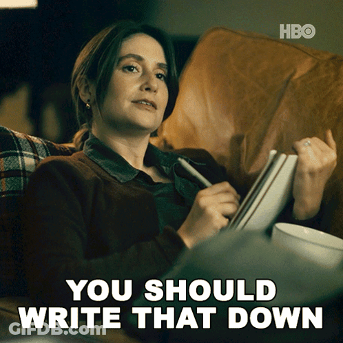 A Woman Sits On A Couch With A Pen In Her Hand And The Words " You Should Write That Down " Next To Her GIF