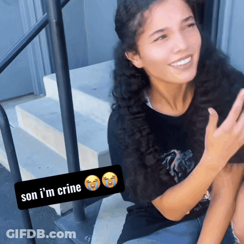 A Woman Sits On A Set Of Stairs With A Sticker Saying Son I 'M Crine GIF