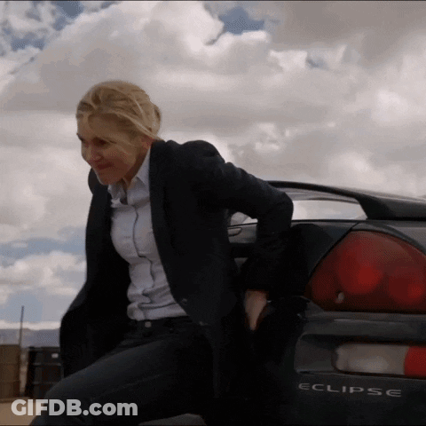 A Woman Sits On The Back Of An Eclipse GIF