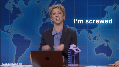 A Woman Sitting At A Desk With A Laptop And The Words I 'M Screwed Above Her GIF