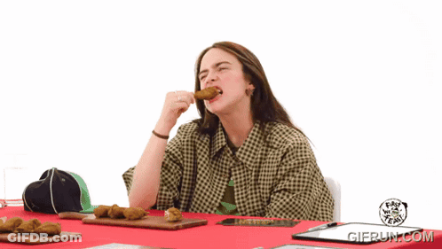 A Woman Sitting At A Table With A Clipboard That Says Gifrun.com On The Bottom GIF