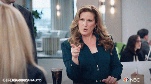 Woman With Soda And NBC Logo GIF