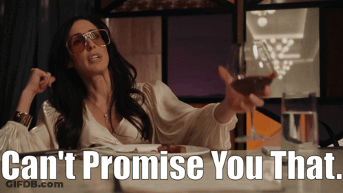 A Woman Sitting At A Table With A Glass Of Wine And The Words " Can 'T Promise You That " Above Her GIF