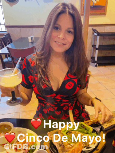 A Woman Sitting At A Table With A Margarita And A Plate Of Food With The Words Happy Cinco De Mayo Below Her GIF