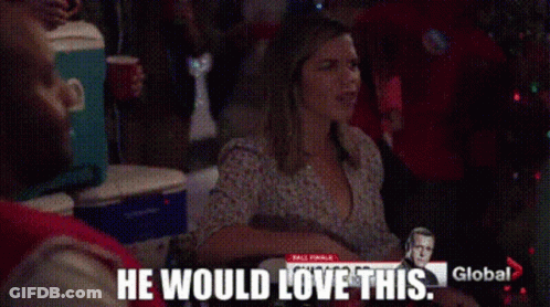 A Woman Sitting At A Table With The Words He Would Love This On The Screen GIF
