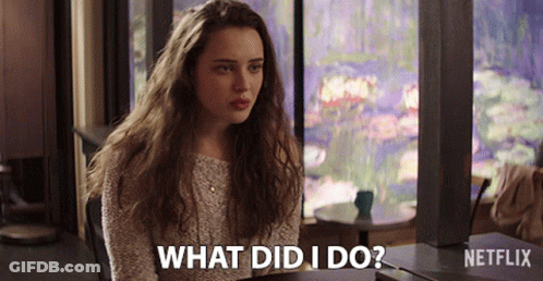A Woman Sitting At A Table With The Words What Did I Do Written On The Bottom GIF