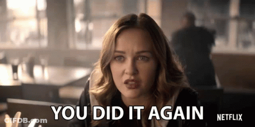 A Woman Sitting At A Table With The Words You Did It Again Netflix Written On The Bottom GIF