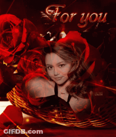 A Woman Sitting In A Basket With Roses And The Words For You GIF