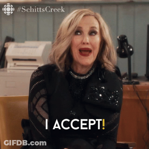 A Woman Sitting In A Chair With Her Mouth Open And The Words I Accept Below Her GIF