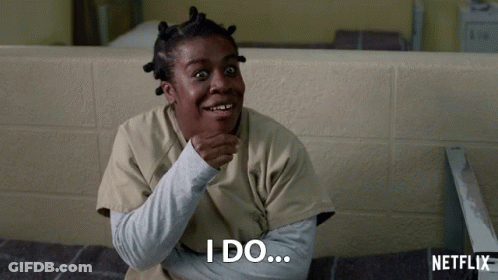 A Woman Sitting In A Chair With Netflix Written On The Bottom GIF
