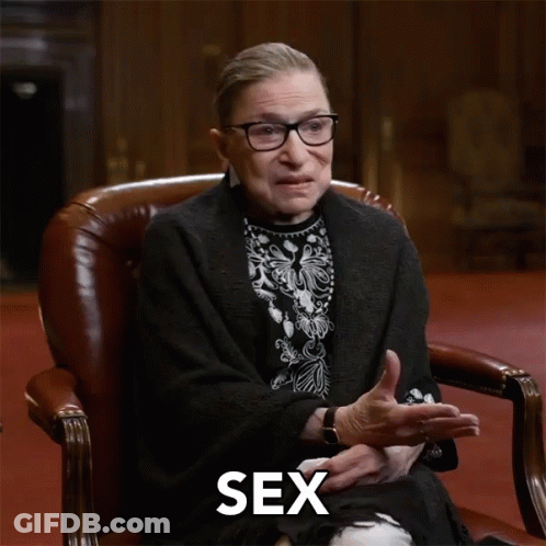 A Woman Sitting In A Chair With The Word Discrimination Written On The Bottom GIF