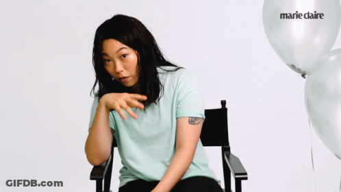 A Woman Sitting In A Chair With The Words Are They Confuse On The Bottom GIF