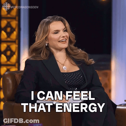 A Woman Sitting In A Chair With The Words I Can Feel That Energy Above Her GIF