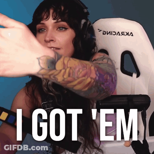 Woman Sitting In Chair With I Got Em Text GIF