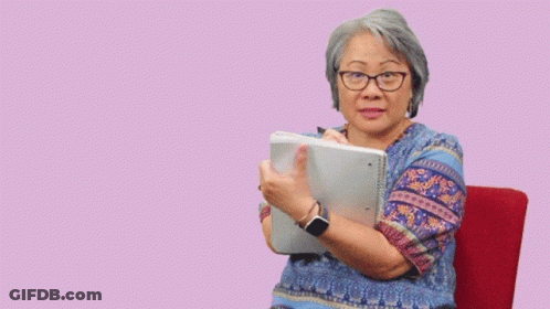A Woman Sitting In A Chair With The Words I 'M Listening Above Her GIF