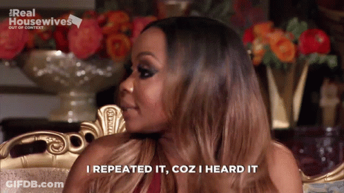A Woman Sitting In A Chair With The Words I Repeated It Coz I Heard It Next To Her GIF