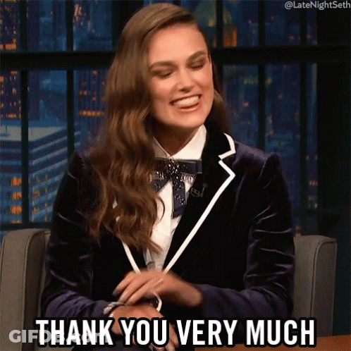 A Woman Sitting In A Chair With The Words Thank You Very Much Above Her GIF